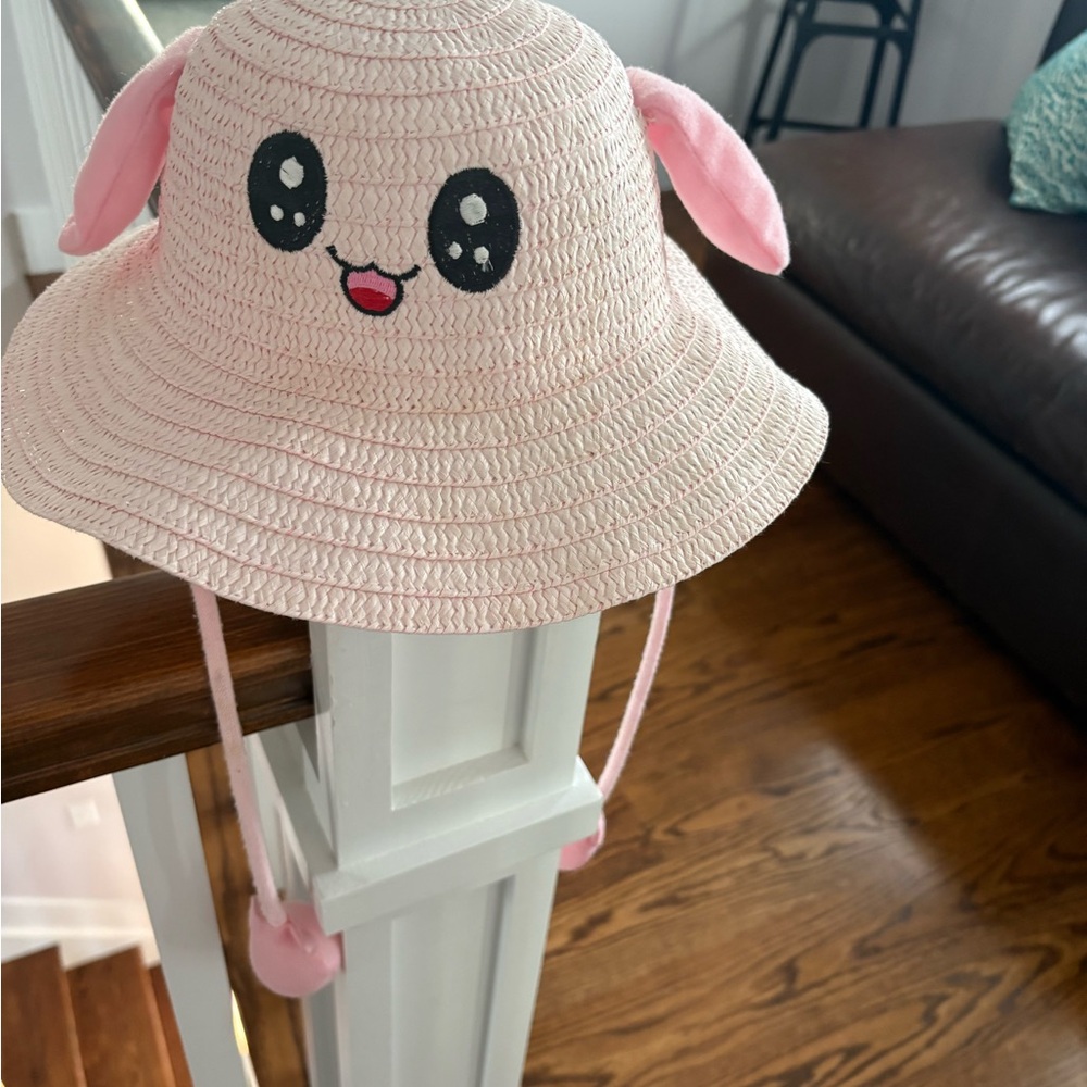 Adorable Pink Kids Hat with Cute Face Design